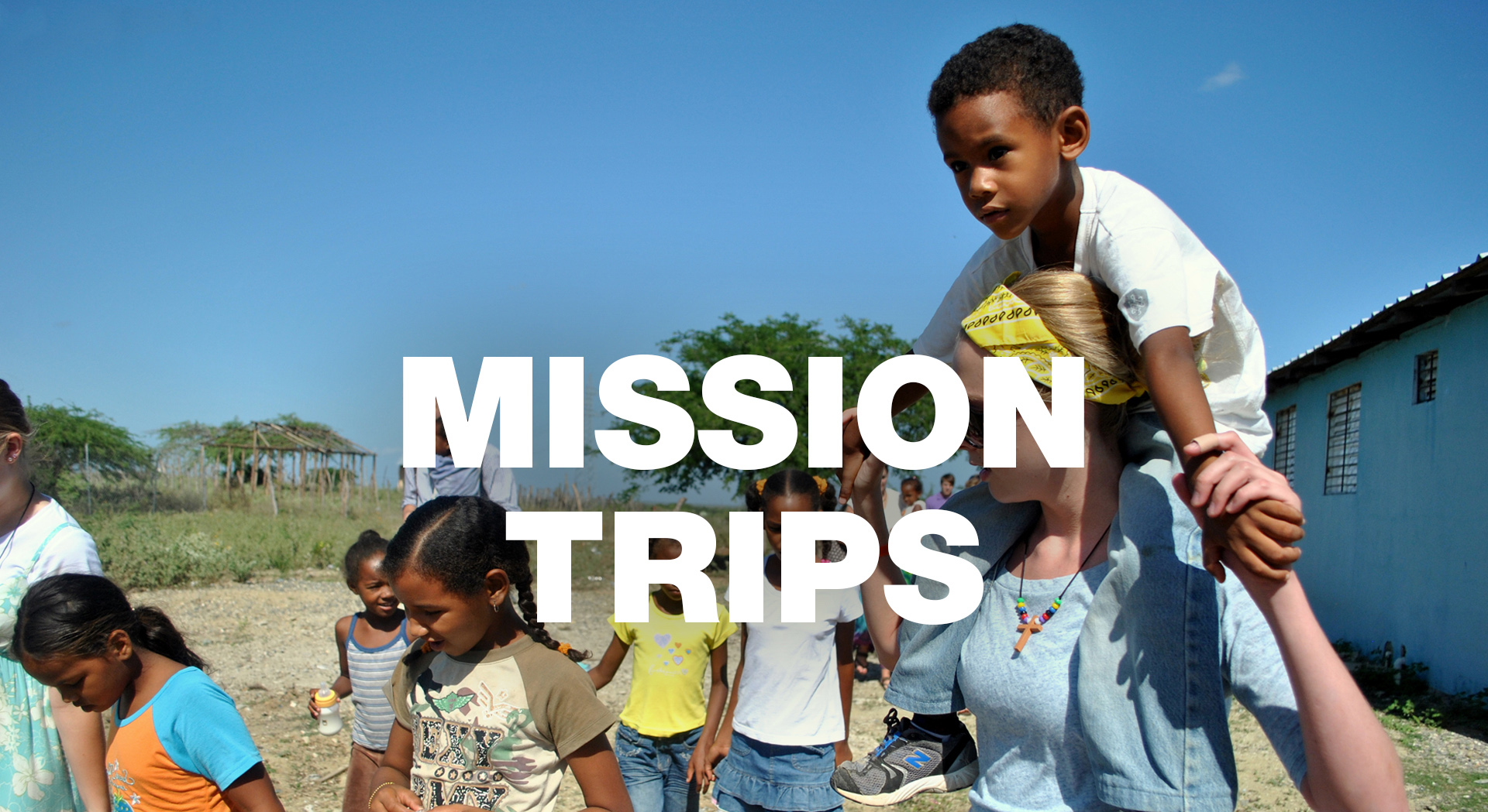 Child being carried during church Mission trip